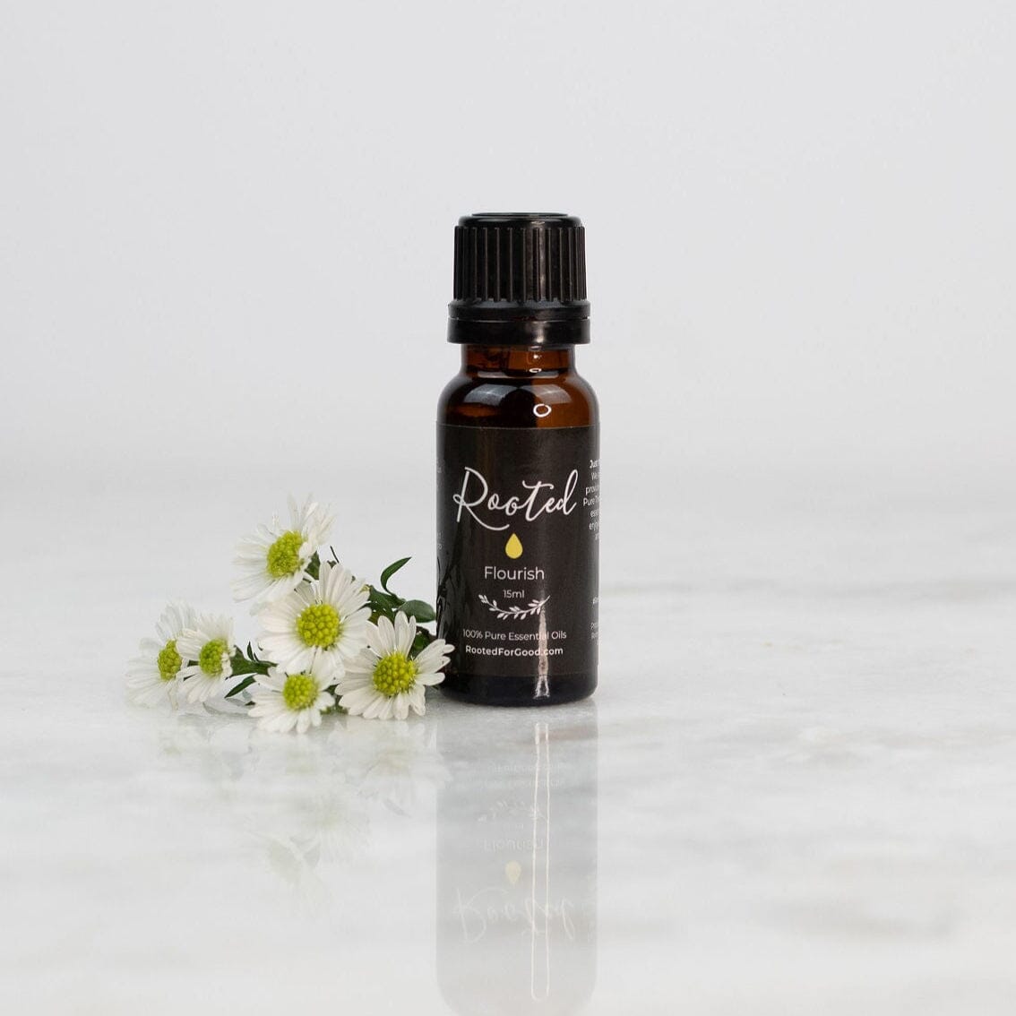 Flourish blend label showing uplifting floral and citrus essential oil ingredients
