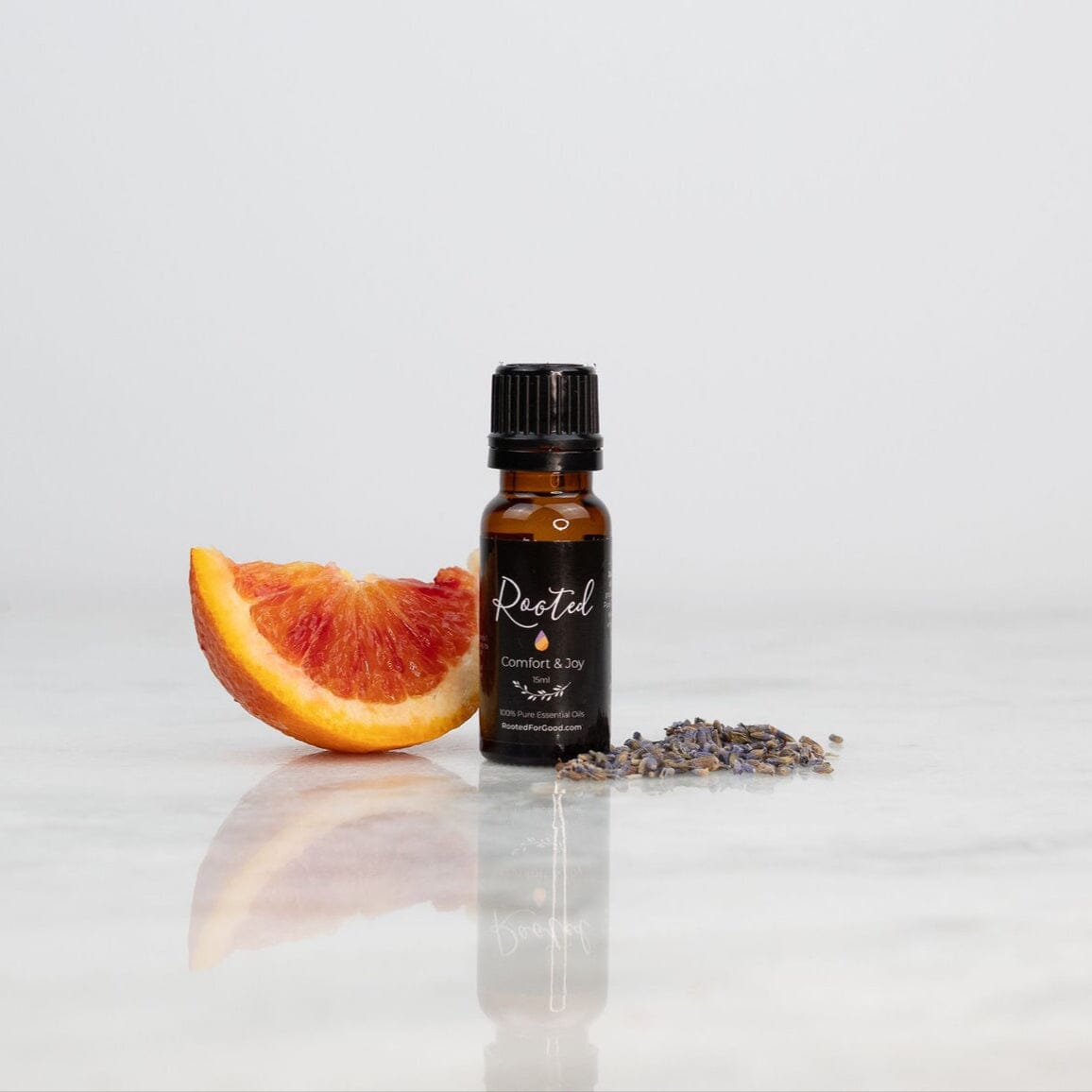 Comfort and Joy essential oil blend 15ml bottle by Rooted For Good