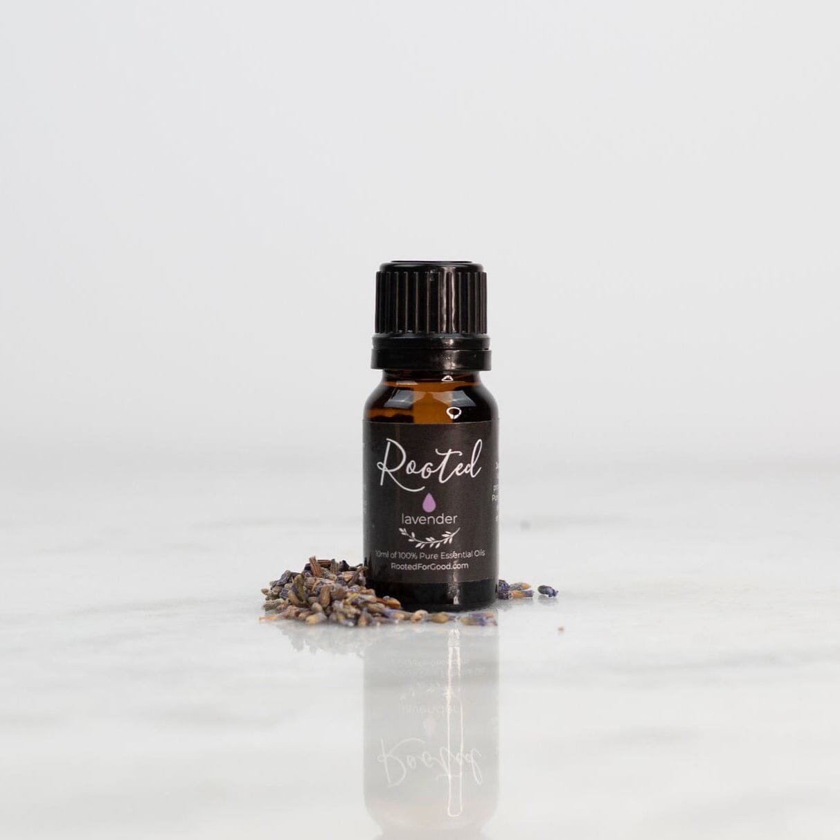Lavender essential oil 15ml bottle by Rooted For Good with calming floral aroma